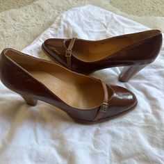 Salvatore Ferragamo Glossy Brown Leather Pumps Size 7.5 Us Women Never Worn, Good Used Condition. Does Not Come With Box. Classy And Chic Pumps By Ferragamo. In "Marron Glac" Brown Color, Shiny And Glossy Patent Leather. Wooded Heel 9cm / 3.5 Inches, Rounded Toe. Leather Strap Detail On The Front. Outer Rubber Sole. Made In Italy. Tags: Women’s Heels, Pumps, Brown, Leather, Luxury, Designer Business Patent Leather Heels With Leather Lining, Luxury Brown Leather Court Shoes, Classic Patent Leather Heels With Buckle Closure, Classic Ankle Strap Heels For Galas, Elegant Brown Leather Heels, Timeless Leather Heels Medium Width, Classic Leather Court Shoes With Heel Tab, Leather Sole Heels For Galas, Ankle Strap Court Shoes For Business