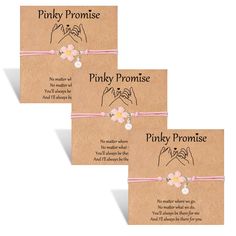 three cards with pinky promise written on the front and one has two hands holding flowers