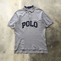 POLO SPORT By Ralph Lauren Spellout Polo Shirt TAG : Polo Sport SIZE : Large MEASUREMENT , - Width (Armpit to armpit) : 23.5" - Length (Shoulder the end of garment) : 32.5"Front 35"Back - Shoulder : 21.5" CONDITION : Perfect wear, no holes and stains SHIPPING, all item will be shipped with tracking number. Item received within 14-21 working days. Sporty Collared Tops With Graphic Print, Sporty Polo Collar T-shirt With Relaxed Fit, Sporty Collared Polo Shirt With Logo Print, Sporty Collared Top With Letter Print, Casual Collared Tops For College, Sporty Collared Polo Shirt With Letter Print, Classic Polo Shirt With Logo Print For Streetwear, Casual Polo Shirt With Letter Print And Polo Collar, Casual Polo Shirt With Letter Print