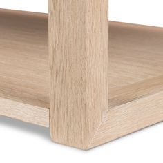 a close up view of a wooden bed frame