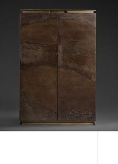 a brown cabinet with two doors on the front and one door open to reveal something