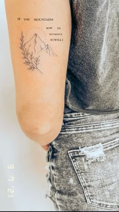 a woman's arm with a tattoo saying if the mountains don't do so well