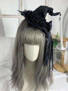 Complete your gothic Halloween look with our cross charm gothic black floral design witch hat. This stylish hat features intricate floral patterns, rhinestoned bowknot detailing, and a striking cross charm, adding a touch of mystique to your outfit. Made for the fashion-forward witch, this hat is the perfect accessory for any Halloween gathering or costume party. Stand out from the crowd and embrace your dark side with this bewitching accessory.   Please note that this product includes the hat o Gothic Hat For Halloween And Alternative Fashion, Gothic Hat For Halloween, Gothic Halloween Hat For Alternative Fashion, Black Gothic Hat For Costume, Black Fitted Witchy Hat, Black Gothic Mini Hats For Costume Party, Black Gothic Hat For Cosplay, Fitted Black Witchy Hat, Black Gothic Mini Hat With Adjustable Fit