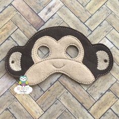 a monkey mask is sitting on the floor