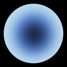 a blue circular object is shown in the dark