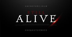 a black and red typeface with the words still alive