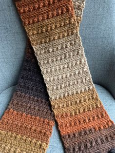 Harvest scarf is a beautiful ombré of brown, orange, beige it's a perfect fall accessory that will take you right into the colder months. Winter is coming stay warm and cozy with this textured puff stitch. Makes an excellent gift for the holidays! Winter accessories are my favorite 😍 Boho Wallet, Puff Stitch, Fall Scarves, Fall Accessories, Winter Is Coming, Winter Accessories, Brown Orange, Scarf Wrap, Warm And Cozy