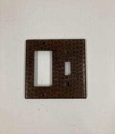 a single light switch cover with two plates