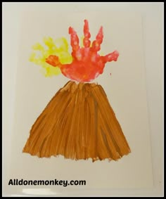 this is an image of a handprint volcano made with children's hands and watercolors