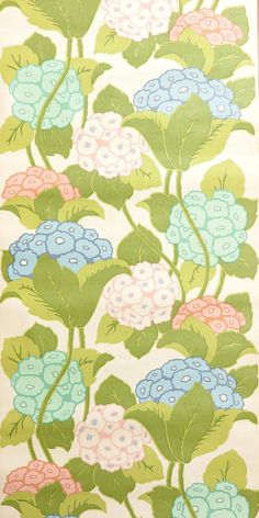 an image of a flowered design on a white background with blue, pink and green flowers