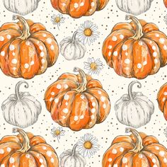 an orange and white pumpkin pattern with daisies on the side, in front of a polka dot background