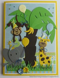 an animal themed birthday card with monkeys, giraffes, and a palm tree