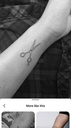 a person with a tattoo on their arm has scissors tattooed on his left wrist and the words more like this