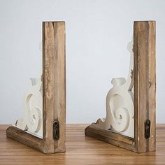 These Two-Tone Corbel Shelf Brackets add a vintage accent to your wall decor. Place a flat board on top of them to create a custom shelf for your wall. Set includes two (2) brackets Each bracket measures 9.5L x 2W x 11.5H in. Crafted of wood and metal Two-tone wood finish L-shaped with curved details Hues of white and brown Features keyhole slots for easy hanging Shelf not included Care: Dust with a soft, dry cloth. This item is available at Kirklands.com only, not available in stores. Please note: this item cannot be shipped to APO/FPO addresses. | Two-Tone Corbel Shelf Brackets, Set of 2, White, 9.5L x 2W 11.5H , Metal/Wood | Kirkland's Home Den Remodel, Custom Shelf, Corbel Shelf, Shelving Brackets, Wooden Corbels, Wood Corbels, Hanging Shelf, White Shabby Chic, Shelf Brackets