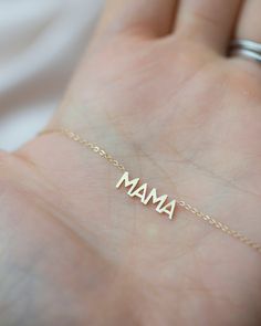 In celebration of all the great mothers around the world, treat the mom in your life to this piece of jewelry they deserve with this gold mama necklace. A perfect way to express what means most to you! Available in 14K yellow, rose or white gold Letters measure about 5mm in height Necklace total length is measured from end to end Dainty minimalist everyday necklace Mama Necklace, Real Gold Jewelry, Initial Necklace Gold, Belly Chain, Everyday Necklace, Gold Initial, New Mothers, Gold Letters, Letter Necklace