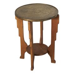 a small wooden table with a metal top