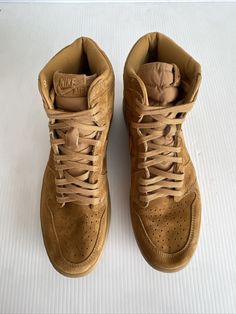 Nike Air Jordan 1 Retro High OG “Wheat” Golden Harvest Sneaker Style#: 555088-710 Golden Harvest/Golden Harvest-Gum Yellow Mens Size: 12US / 11UK / 46EU The Air Jordan 1 Retro High OG went all-wheat for Holiday 2017. This pair comes in an all-new golden harvest and gum yellow colorway. Sporting a winter-inspired full suede upper with a nylon tongue, original "Nike Air" branding and a full translucent gum sole. Lace up Genuine Leather, Genuine Suede, Nylon, Rubber Imported very gently used / overall excellent condition Golden Harvest, Nike Air Jordan 1 Retro, Winter Inspired, Sneaker Style, Air Jordan 1 Retro High Og, Air Jordan 1 Retro High, Nike Air Jordan 1, Air Jordan 1 Retro, Jordan 1 Retro High