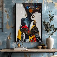 a painting on the wall next to a table with a vase and potted plant