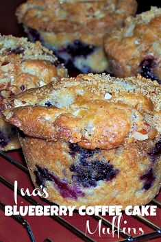 blueberry coffee cake muffins cooling on a rack