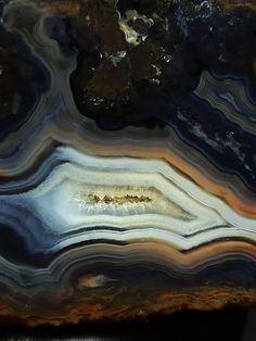 an abstract piece of art that looks like it is made out of agate stone