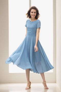 Blue Chiffon A-line Maxi Dress, Elegant A-line Chiffon Dress For Spring, Modest Flowy A-line Dress, Summer Bridesmaid Chiffon Dress With Flowy Skirt, Flowy A-line Breezy Dress, Chiffon Bridesmaid Midi Length Dress, Summer Wedding Knee-length Chiffon Dress, Fitted Midi-length Chiffon Bridesmaid Dress, Fitted Midi Chiffon Bridesmaid Dress