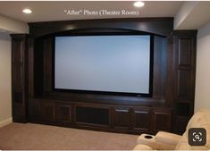 a large screen in the corner of a room