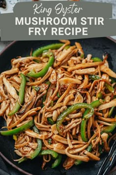 stir fry with mushrooms and green peppers in a black plate on top of a white tablecloth