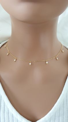 This necklace is made with natural freshwater pearls (3 mm), 14k gold filled chain and 14k gold filled clasp.  Please contact me in case you have any questions. Dainty Pearl Drop Charm Necklace, Delicate 14k Gold Filled Charm Necklaces With Pearl Pendant, Dainty Pearl Charm Necklace With Delicate Chain, Delicate 14k Gold-filled Charm Necklace With Pearl Pendant, Delicate 14k Gold-filled Pearl Chain Charm Necklace, Delicate 14k Gold Filled Charm Necklace With Pearl Chain, Dainty 14k Gold Filled Charm Necklace With Pearl Pendant, Dainty Gold Plated Necklaces With Pearl Charm, Delicate 14k Gold Filled Necklaces With Pearl Charm