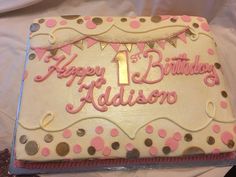 a birthday cake with pink and gold decorations