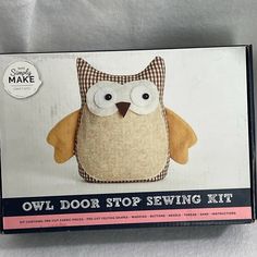 the owl door stop sewing kit is in its box