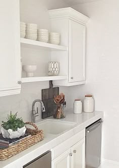 the kitchen is clean and ready for us to use it's dishwasher