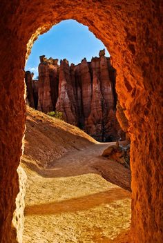 an arch in the side of a rock formation