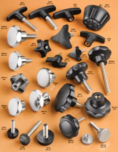 an assortment of knobs and screws are shown