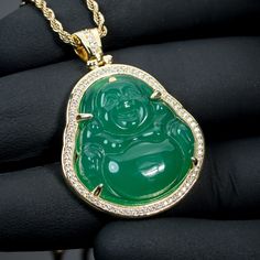 Small Iced Cz Yellow Gold Hip Hop Green Jade Buddha Pendant Rope Chain Necklace Chain Material: 316 Stainless Steel/14k Gold Plating. Pendant Size: 35mm In Length. Stone: Cz Chain Width: 2mm Chain Length: 18,20,22, Or 24 Inches Spiritual Jade Round Pendant Necklace, Luxury Jade Pendant Necklace, Jade Buddha Necklace, Nickel-free Jade Pendant Jewelry, Green Jade Buddha Necklace, Jade Buddha, Jade Necklace Pendant Chinese, Buddha Necklace, Rope Chain Necklace