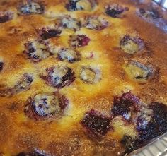 a pie with blueberries and other toppings on it