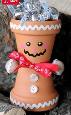 a clay pot with some candy in it