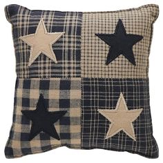 a black and white checkered pillow with stars on the front, one star has been embroidered onto it