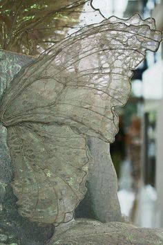 a close up view of a butterfly statue