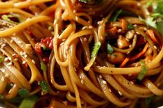 a close up of a plate of food with noodles