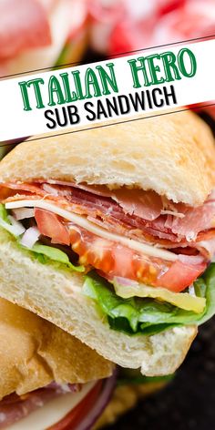 there is a sandwich with meat and lettuce on the side, along with an italian hero sub sandwich