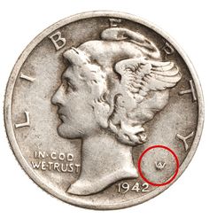 an image of a coin with a red marker on it