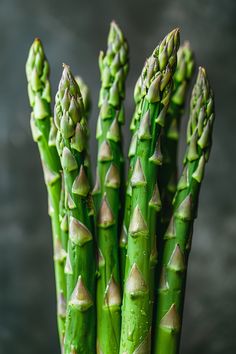 Fresh green asparagus spears standing upright. Parmesan Crusted Asparagus, Lemon Garlic Asparagus, Easy Bakes, Asparagus Stuffed Chicken Breast, Easy Asparagus Recipes, Asparagus Dishes, Zesty Salad, Creamy Asparagus, Dinner Games