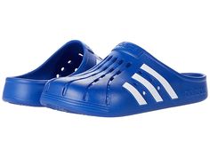 adidas Adilette Clog - Shoes : Team Royal Blue/White/Team Royal Blue : For a casual, cool vibe, head to your work out in the comfy adidas Adilette Clog. Based on the iconic adidas slide, these sport-inspired clogs have a soft feel and are both functional and comfortable featuring a contoured EVA footbed. Sport-inspired clogs with a soft feel. Slip-on construction. Contoured EVA footbed. Regular fit. Upper, lining, insole, and outsole made of synthetic material. Imported. Measurements: Weight: 5 Sporty Slip-on Slides For Sports, Sporty Slip-on Slides For Outdoor Activities, Sporty Slip-resistant Clogs For Outdoor Activities, Casual Slip-resistant Slides For Training, Summer Synthetic Slip-resistant Clogs, Sporty Slip-resistant Slides For Spring, Adidas Slides For Sports, Breathable Sporty Slides For Spring, Sporty Breathable Slides For Spring