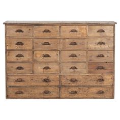 an old wooden dresser with many drawers