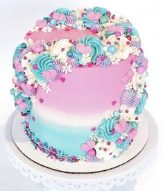 there is a colorful cake with flowers on it