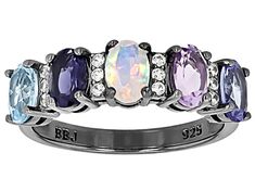 0.45ct Oval Swiss Blue Topaz, 0.38ct Oval Bolivian Amethyst, 0.38ct Oval Tanzanite, 0.11ct Oval Ethiopian Opal, 0.31ct Oval Iolite With 0.14ctw Round White Zircon Black Rhodium Over Sterling Silver Ring. Measures Approximately 0.98"L x 0.88"W. Not sizeable. Accents stone primarily zircon. Popular Jewelry, Swiss Blue Topaz, Mens Accessories Jewelry, Black Rhodium, Ethiopian Opal, Jewelry Making Beads, Metal Jewelry, Online Jewelry, Sterling Silver Ring