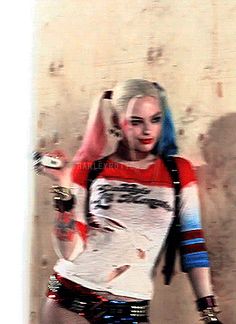 a woman with blue hair is holding a skateboard in her hand and wearing punk clothing