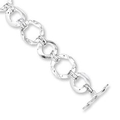 Circular links alternating in size provide modern flair to this contemporary bracelet. The sterling silver bracelet is 7.5 inches in length and fastens with a toggle closure. Contemporary Bracelets, Bracelet For Her, Jewelry Advice, Jared The Galleria Of Jewelry, White Bracelets, Sterling Silver Bracelet, Gemstone Bracelets, Bracelet Designs, Metal Jewelry