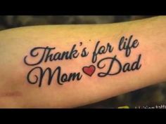 a tattoo that says thank for life mom dad