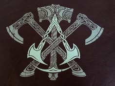 an image of two crossed axes on a t - shirt